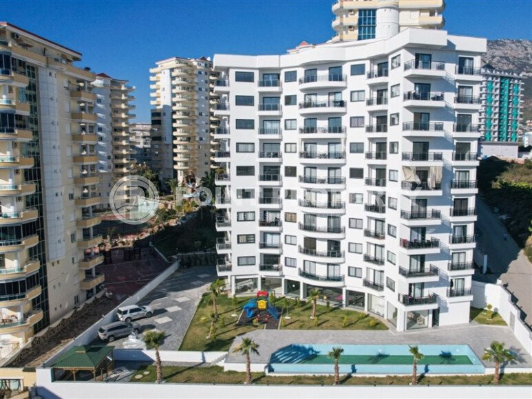 Furnished 2+1 apartment with sea views in a complex with infrastructure in Mahmutlar-id-10244-photo-11