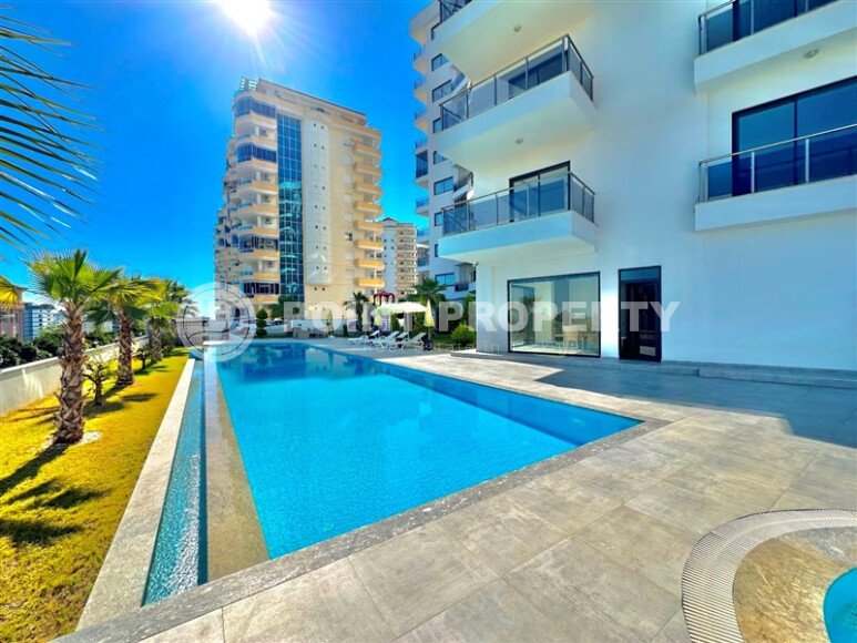 Furnished 2+1 apartment with sea views in a complex with infrastructure in Mahmutlar-id-10244-photo-12