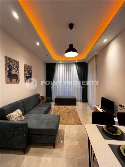 Furnished 1+1 apartment in a complex with developed infrastructure in Mahmutlar-id-10245-photo-1