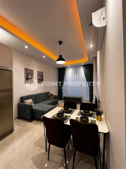 Furnished 1+1 apartment in a complex with developed infrastructure in Mahmutlar-id-10245-photo-2