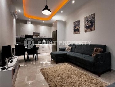 Furnished 1+1 apartment in a complex with developed infrastructure in Mahmutlar-id-10245-photo-3