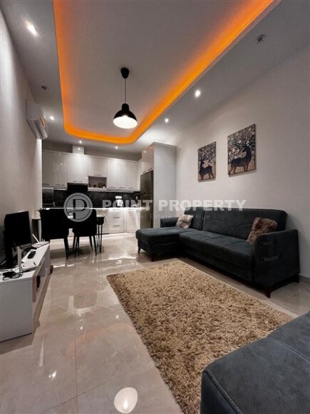 Furnished 1+1 apartment in a complex with developed infrastructure in Mahmutlar-id-10245-photo-3