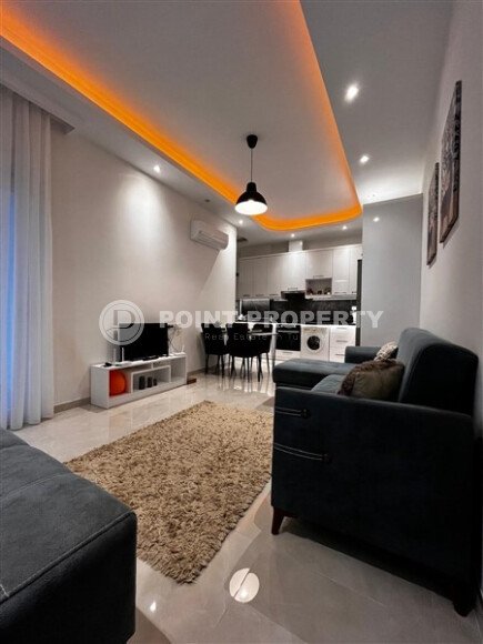 Furnished 1+1 apartment in a complex with developed infrastructure in Mahmutlar-id-10245-photo-4