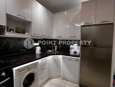 Furnished 1+1 apartment in a complex with developed infrastructure in Mahmutlar-id-10245-photo-5