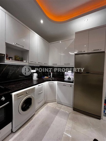 Furnished 1+1 apartment in a complex with developed infrastructure in Mahmutlar-id-10245-photo-5