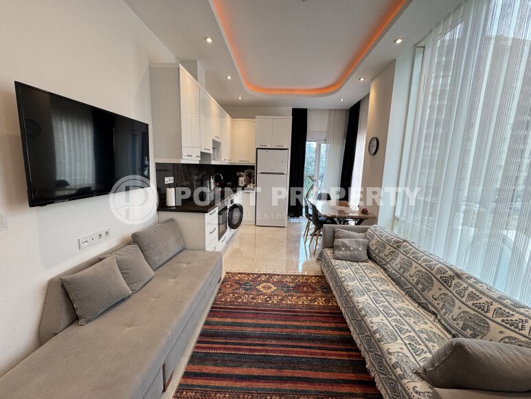 Современные 62 м² в стильной резиденции с курортной инфраструктурой у моря в Махмутларе-id-10255-фото-2