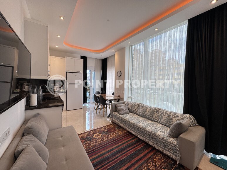 Современные 62 м² в стильной резиденции с курортной инфраструктурой у моря в Махмутларе-id-10255-фото-4