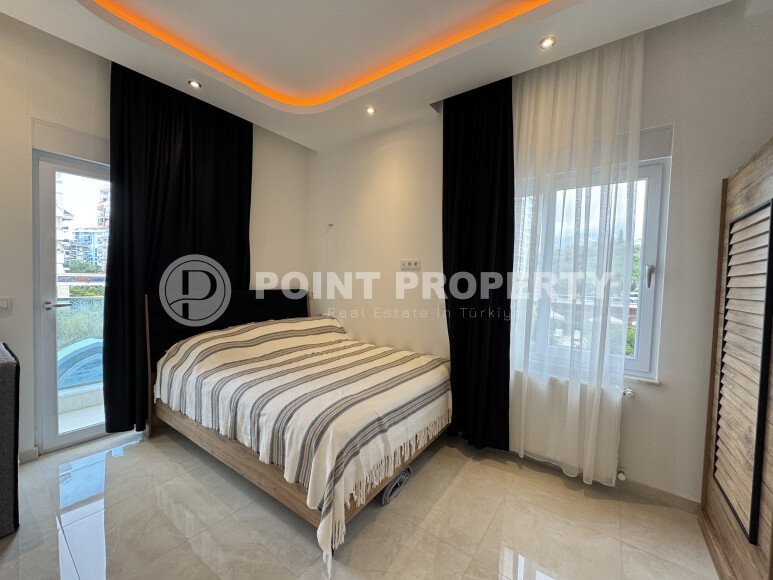 Современные 62 м² в стильной резиденции с курортной инфраструктурой у моря в Махмутларе-id-10255-фото-6