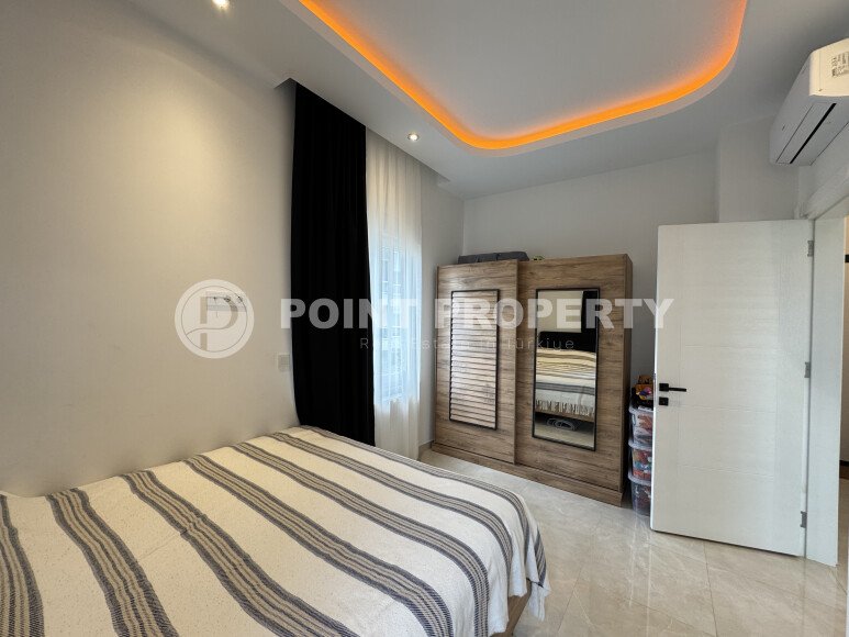 Современные 62 м² в стильной резиденции с курортной инфраструктурой у моря в Махмутларе-id-10255-фото-7