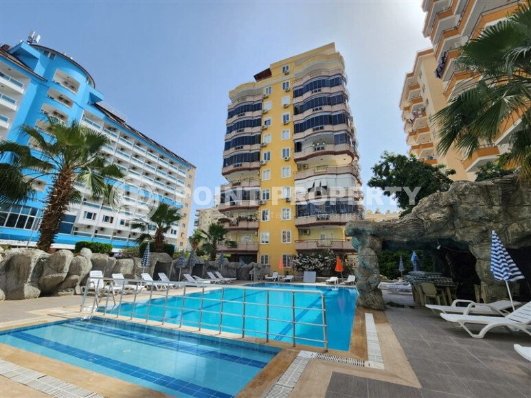 A cozy furnished apartment of 125 m² in a complex with infrastructure in Mahmutlar near the sea-id-10258-photo-1