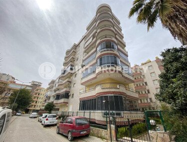 Современная и светлая квартира 110 м² с двумя балконами в комплексе с бассейном в Махмутларе-id-10259-фото-9