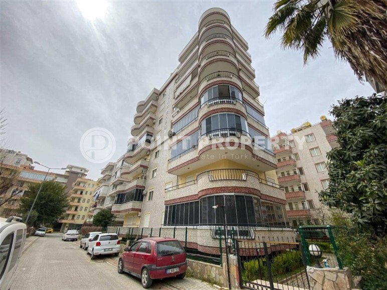 Современная и светлая квартира 110 м² с двумя балконами в комплексе с бассейном в Махмутларе-id-10259-фото-1