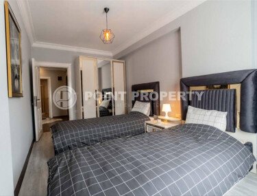 Современная и светлая квартира 110 м² с двумя балконами в комплексе с бассейном в Махмутларе-id-10259-фото-4