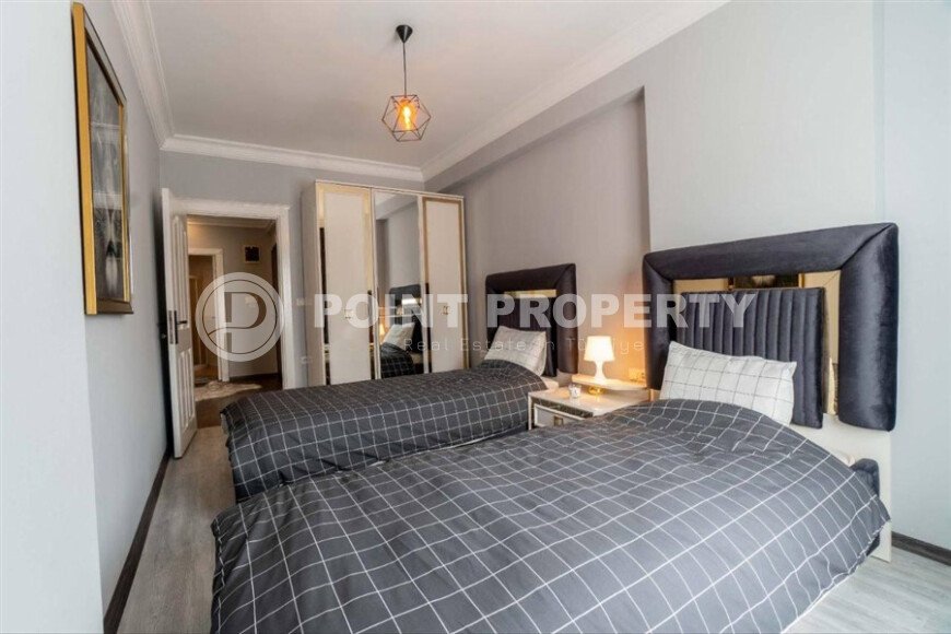 Современная и светлая квартира 110 м² с двумя балконами в комплексе с бассейном в Махмутларе-id-10259-фото-4