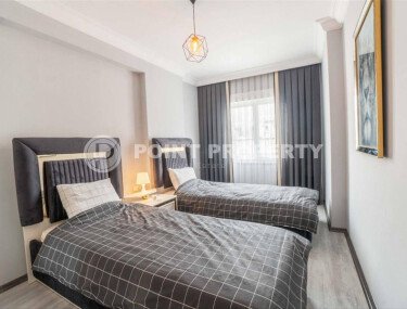 Современная и светлая квартира 110 м² с двумя балконами в комплексе с бассейном в Махмутларе-id-10259-фото-5