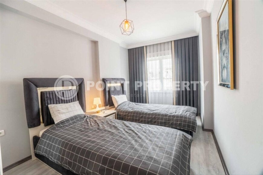 Современная и светлая квартира 110 м² с двумя балконами в комплексе с бассейном в Махмутларе-id-10259-фото-5