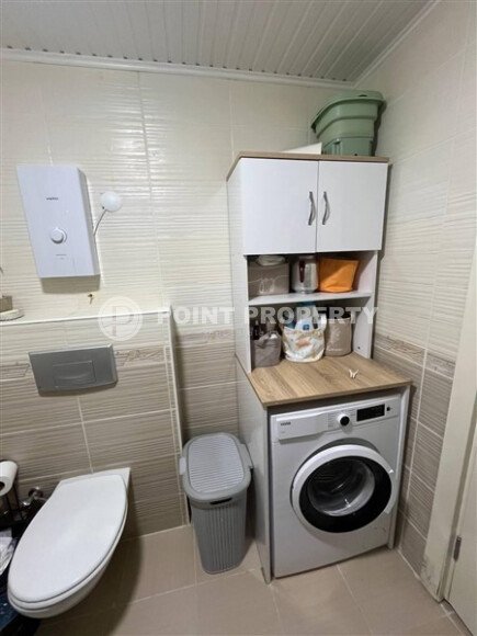 Современная и светлая квартира 110 м² с двумя балконами в комплексе с бассейном в Махмутларе-id-10259-фото-6