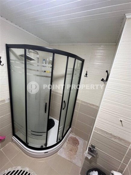 Современная и светлая квартира 110 м² с двумя балконами в комплексе с бассейном в Махмутларе-id-10259-фото-7