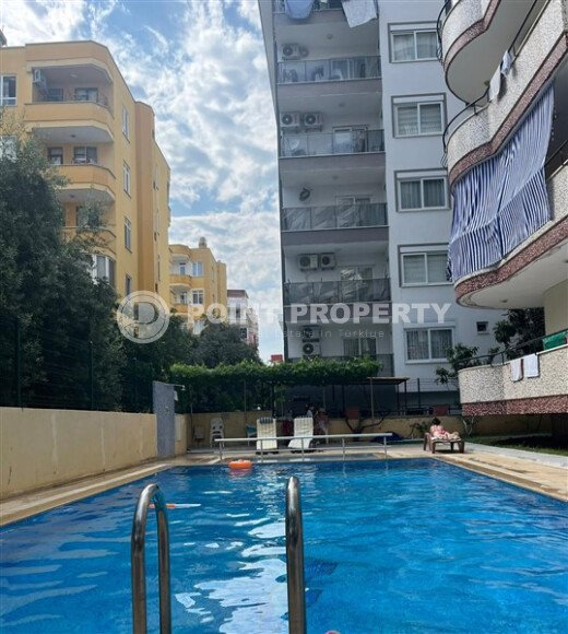 Современная и светлая квартира 110 м² с двумя балконами в комплексе с бассейном в Махмутларе-id-10259-фото-9