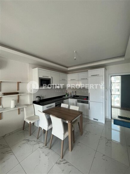 Современная меблированная квартира 65 м² в комплексе с инфраструктурой уровня 5★ в Махмутларе-id-10260-фото-2