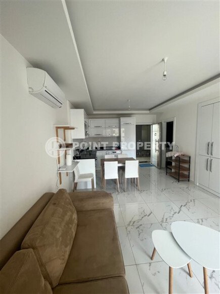 Современная меблированная квартира 65 м² в комплексе с инфраструктурой уровня 5★ в Махмутларе-id-10260-фото-3