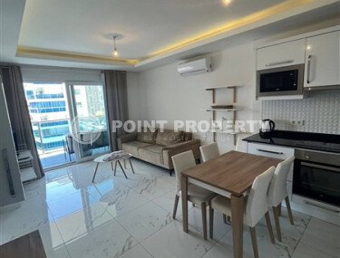 A modern furnished 65 m² apartment in a complex with 5★ level infrastructure in Mahmutlar-id-10260-photo-4