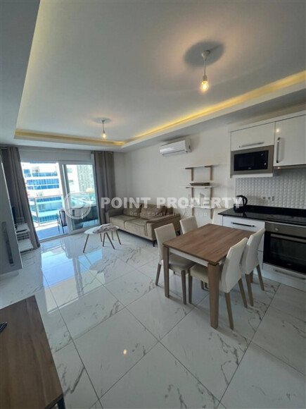 Современная меблированная квартира 65 м² в комплексе с инфраструктурой уровня 5★ в Махмутларе-id-10260-фото-4