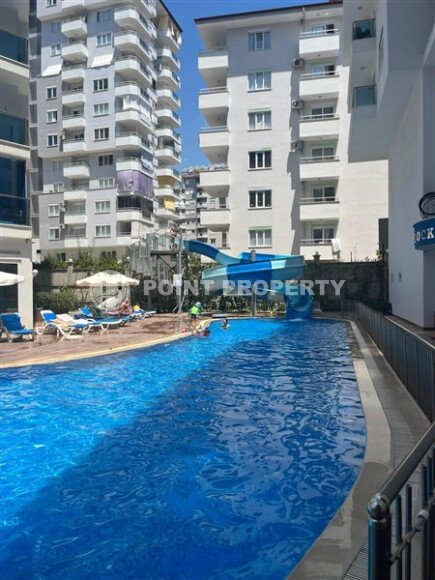 Современная меблированная квартира 65 м² в комплексе с инфраструктурой уровня 5★ в Махмутларе-id-10260-фото-8