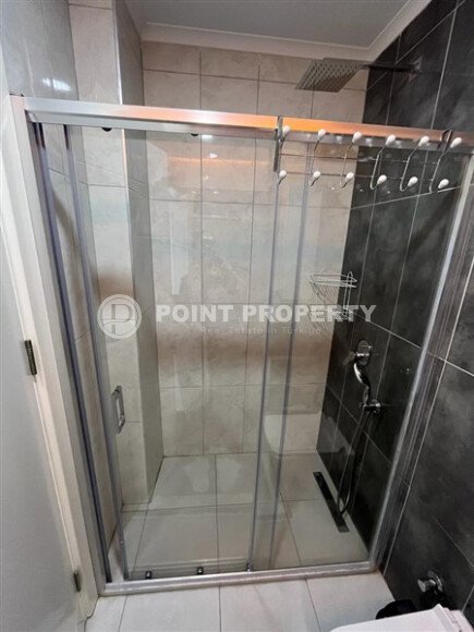 Светлая меблированная квартира 56 м² с видом на инфраструктуру в современном комплексе в Махмутларе-id-10261-фото-6