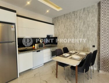 Stylish apartment 55 m², Kargicak district, next to the sea, partial sea view-id-10285-photo-2