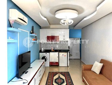 Современная квартира-студия 35 м² в районе Махмутлар-id-10287-фото-3