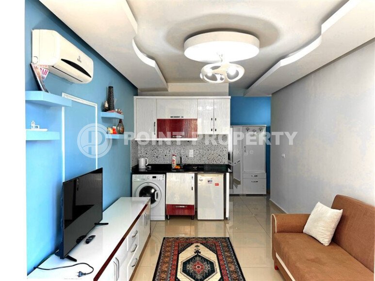Современная квартира-студия 35 м² в районе Махмутлар-id-10287-фото-1