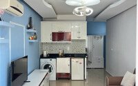 Современная квартира-студия 35 м² в районе Махмутлар-id-10287-фото-3