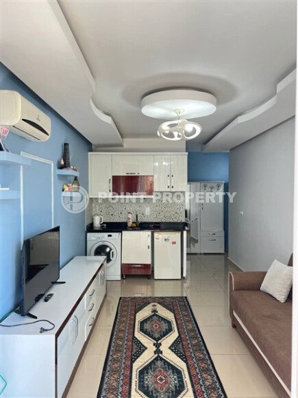 Современная квартира-студия 35 м² в районе Махмутлар-id-10287-фото-3