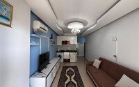 Современная квартира-студия 35 м² в районе Махмутлар-id-10287-фото-4
