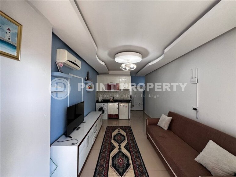 Современная квартира-студия 35 м² в районе Махмутлар-id-10287-фото-4