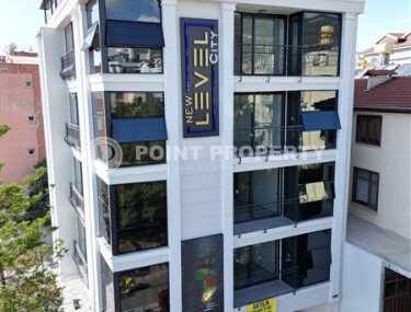 Apartments with 1+1 and 2+1 layouts in a four-story complex under construction in the very center of Alanya-id-3607-photo-1