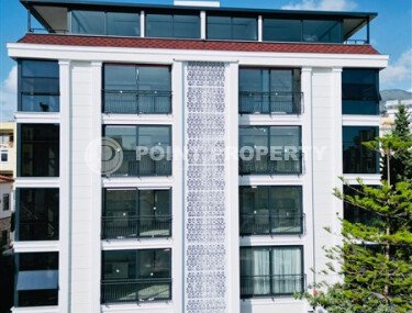 Квартиры с планировкой 1+1 и 2+1 в строящемся четырехэтажном комплексе в самом центре Аланьи-id-3607-фото-3