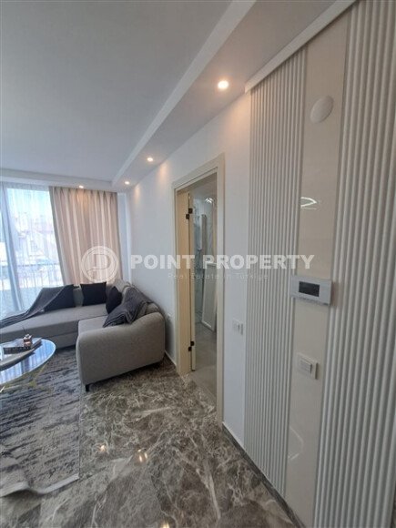 Квартиры с планировкой 1+1 и 2+1 в строящемся четырехэтажном комплексе в самом центре Аланьи-id-3607-фото-10