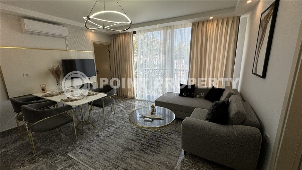 Квартиры с планировкой 1+1 и 2+1 в строящемся четырехэтажном комплексе в самом центре Аланьи-id-3607-фото-11