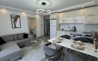 Квартиры с планировкой 1+1 и 2+1 в строящемся четырехэтажном комплексе в самом центре Аланьи-id-3607-фото-12