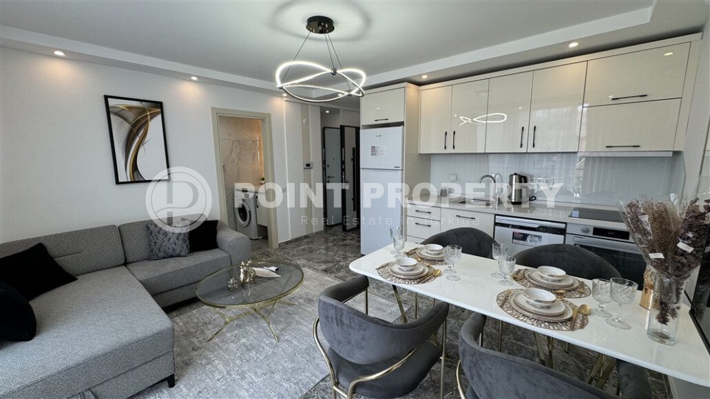 Квартиры с планировкой 1+1 и 2+1 в строящемся четырехэтажном комплексе в самом центре Аланьи-id-3607-фото-12