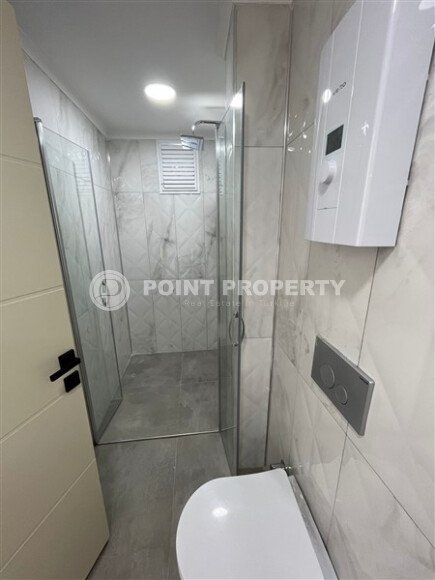 Квартиры с планировкой 1+1 и 2+1 в строящемся четырехэтажном комплексе в самом центре Аланьи-id-3607-фото-18