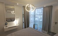 Квартиры с планировкой 1+1 и 2+1 в строящемся четырехэтажном комплексе в самом центре Аланьи-id-3607-фото-19