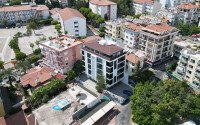 Квартиры с планировкой 1+1 и 2+1 в строящемся четырехэтажном комплексе в самом центре Аланьи-id-3607-фото-20