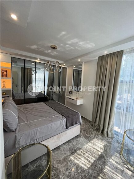 Квартиры с планировкой 1+1 и 2+1 в строящемся четырехэтажном комплексе в самом центре Аланьи-id-3607-фото-21