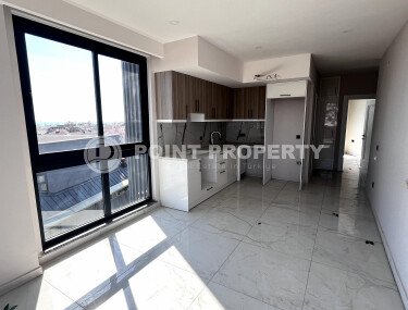 Компактные апартаменты 57 м2 с отличной локацией в самом центре Аланьи. 450 метров до пляжа Клеопатры.-id-3923-фото-3