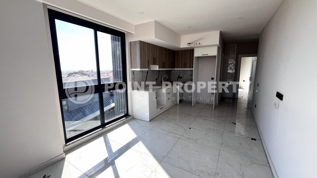 Компактные апартаменты 57 м2 с отличной локацией в самом центре Аланьи. 450 метров до пляжа Клеопатры.-id-3923-фото-3