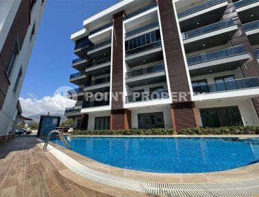 A spacious and cozy 1+1 apartment of 55 m² in a modern residential complex with well-developed infrastructure in Tosmur-id-10290-photo-1