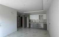 Просторная уютная квартира 1+1 площадью 55 м² в современном жилом комплексе с развитой инфраструктурой в Тосмуре-id-10290-фото-2